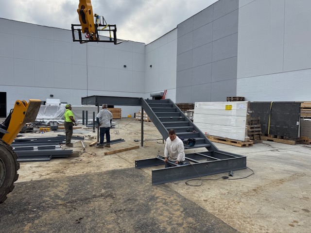 Fabricated steel stair assembly being prepared at Armonk
