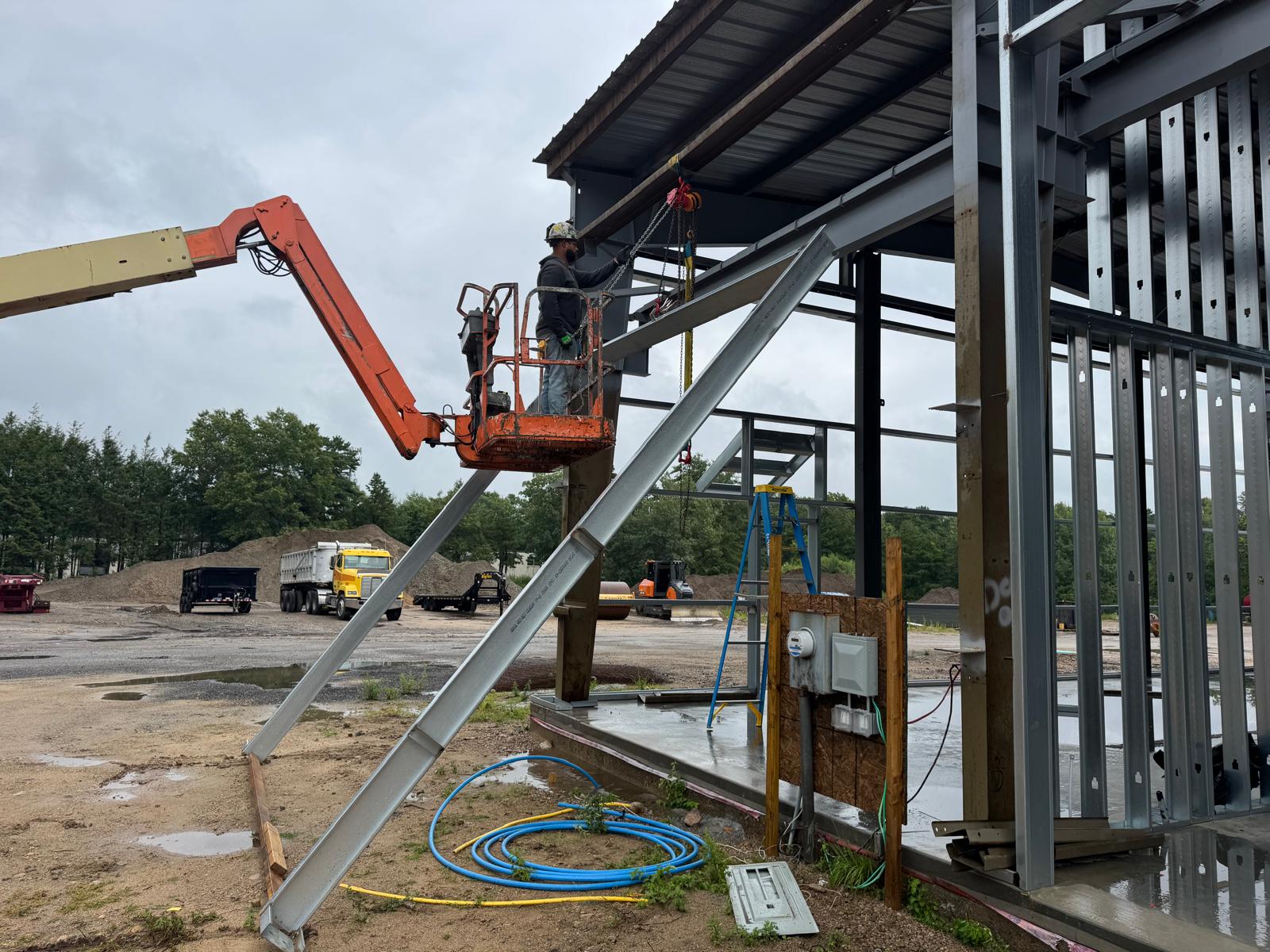 JCSI installing a field-fabricated steel assembly at 67 Stilson Road