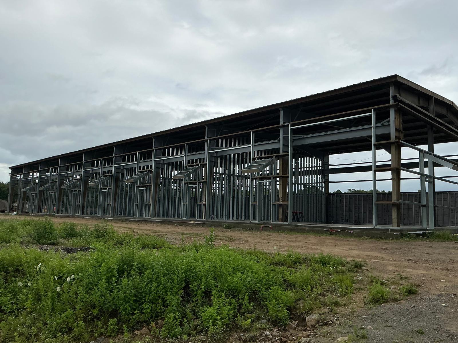Light-gauge steel framing integrated into the existing structure at 67 Stilson Road