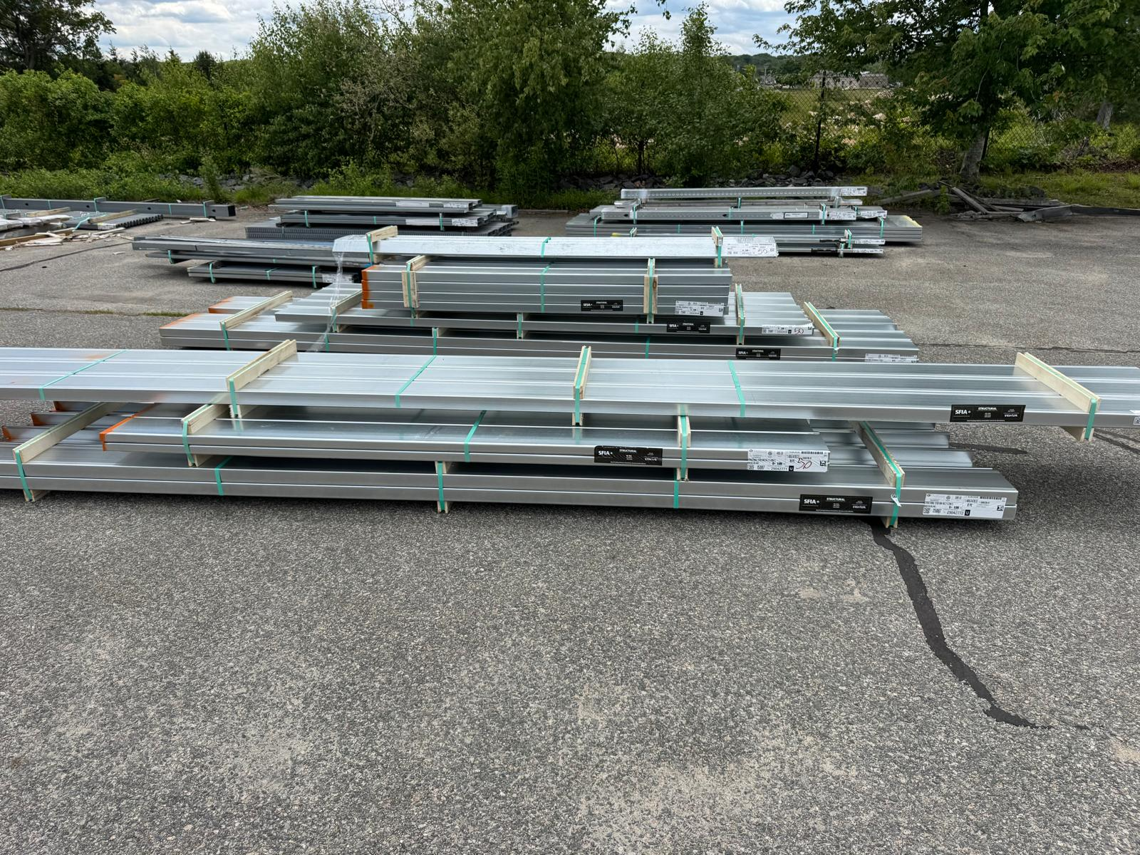 Raw light-gauge steel material delivered for field fabrication at 67 Stilson Road